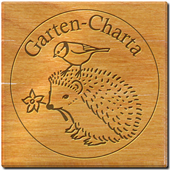C. Emblem aus Lärchenholz